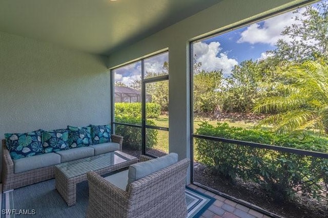 14566 Tropical Dr, Naples, FL 34114 - sunroom with an outdoor hangout area