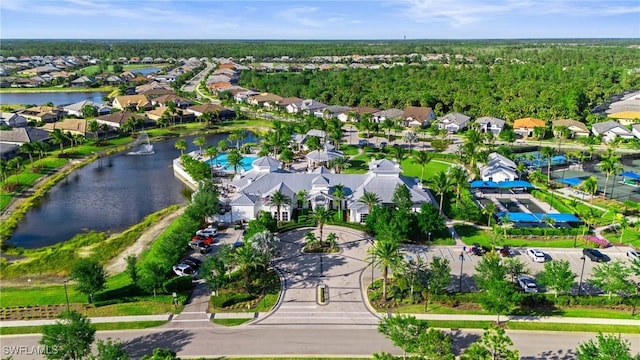 9435 Night Heron Ln, Naples, FL 34120 - drone / aerial view with a residential view and a water view
