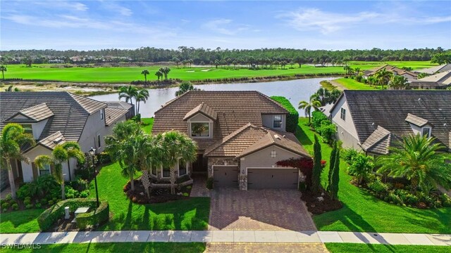 9435 Night Heron Ln, Naples, FL 34120 - drone / aerial view with a water view
