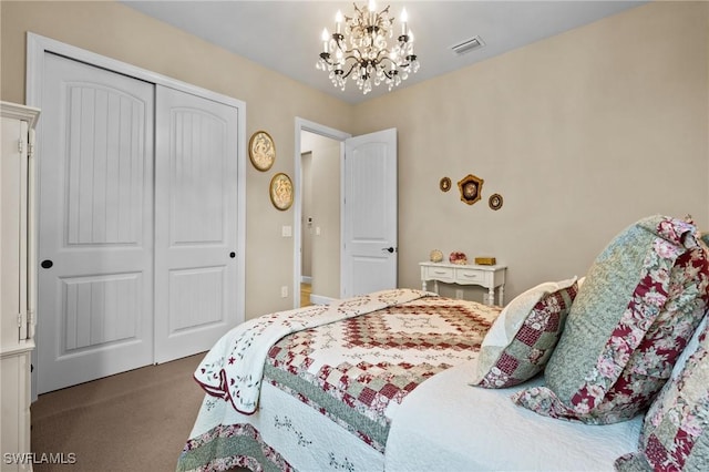 9435 Night Heron Ln, Naples, FL 34120 - bedroom with an inviting chandelier, carpet, a closet, and visible vents