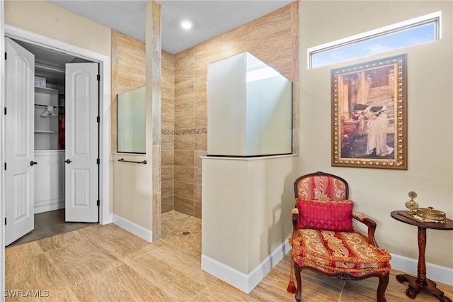 9435 Night Heron Ln, Naples, FL 34120 - full bath with baseboards and a walk in shower