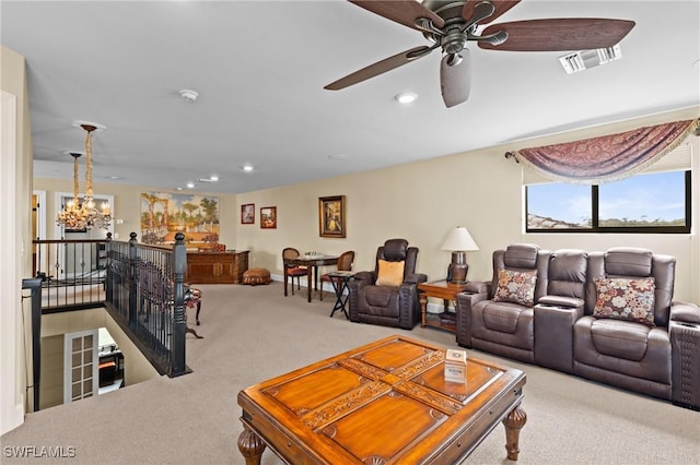 9435 Night Heron Ln, Naples, FL 34120 - living room with carpet flooring, visible vents, recessed lighting, and ceiling fan with notable chandelier