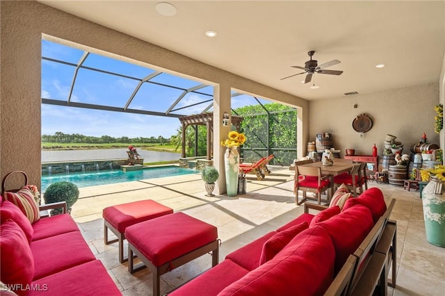 9435 Night Heron Ln, Naples, FL 34120 - view of patio featuring outdoor lounge area, ceiling fan, a lanai, and an outdoor pool