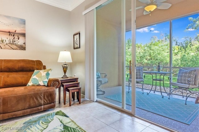 8251 Pathfinder Loop Unit 615, Fort Myers, FL 33919 - sitting room featuring tile patterned flooring, ornamental molding, and a ceiling fan