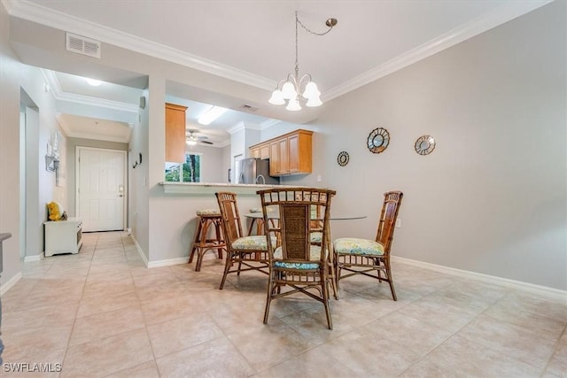 8251 Pathfinder Loop Unit 615, Fort Myers, FL 33919 - dining room featuring crown molding, light tile patterned flooring, a ceiling fan, and a chandelier
