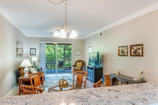 8251 Pathfinder Loop Unit 615, Fort Myers, FL 33919 - dining area featuring a chandelier and ornamental molding