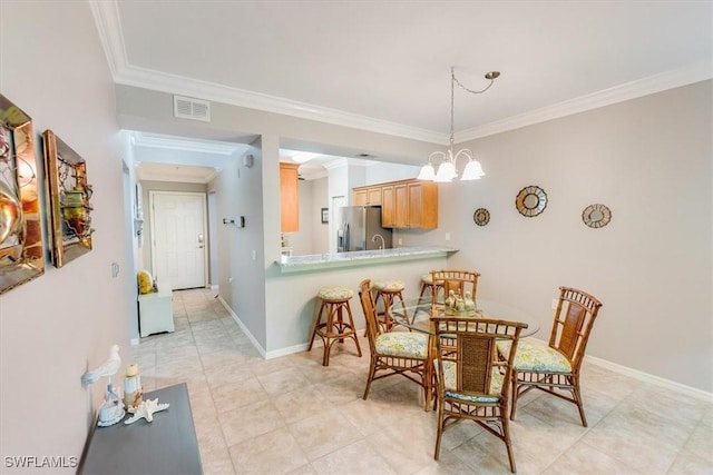 8251 Pathfinder Loop Unit 615, Fort Myers, FL 33919 - dining room featuring crown molding and light tile patterned flooring