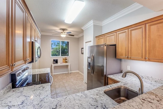 8251 Pathfinder Loop Unit 615, Fort Myers, FL 33919 - kitchen with stainless steel appliances, crown molding, light stone counters, light tile patterned floors, and a ceiling fan