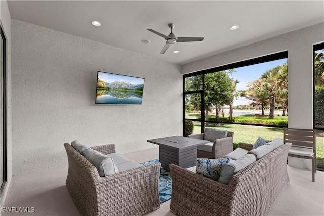 view of patio / terrace with a ceiling fan and an outdoor hangout area
