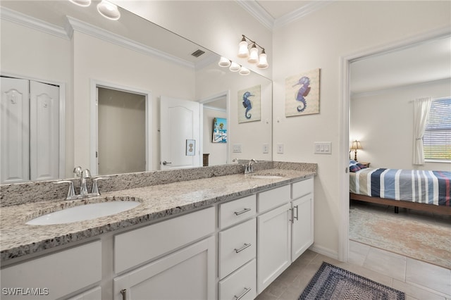 3657 Crimson Ln, Fort Myers, FL 33916 - ensuite bathroom with double vanity, crown molding, tile patterned floors, and baseboards
