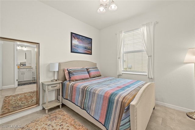 3657 Crimson Ln, Fort Myers, FL 33916 - bedroom featuring baseboards, light tile patterned floors, and ensuite bath