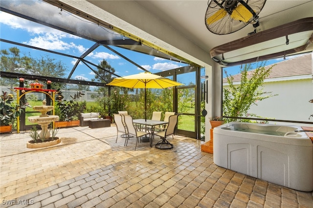 3657 Crimson Ln, Fort Myers, FL 33916 - view of patio featuring a hot tub, glass enclosure, a ceiling fan, and outdoor dining space