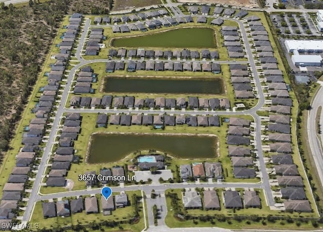 3657 Crimson Ln, Fort Myers, FL 33916 - aerial view of property's location featuring nearby suburban area and a large body of water