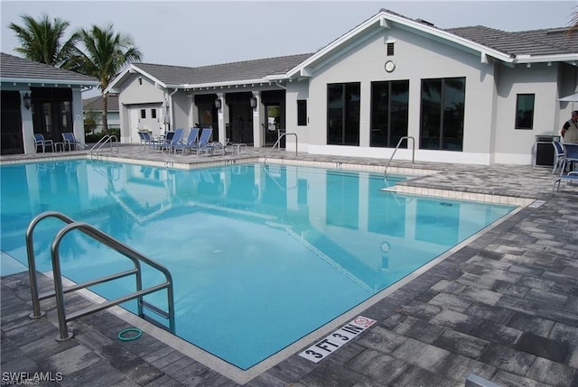 3657 Crimson Ln, Fort Myers, FL 33916 - community pool featuring a patio