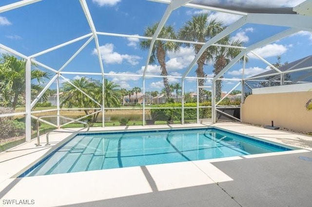 7857 Umberto Ct, Naples, FL 34114 - outdoor pool with a patio area and a lanai