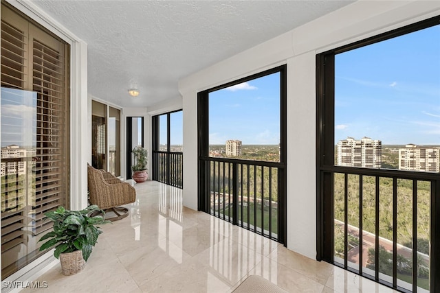 8171 Bay Colony Dr Unit 1902, Naples, FL 34108 - sunroom / solarium with a textured ceiling