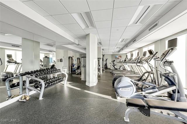 8171 Bay Colony Dr Unit 1902, Naples, FL 34108 - gym with a drop ceiling and baseboards