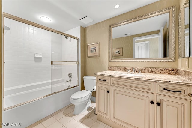 8171 Bay Colony Dr Unit 1902, Naples, FL 34108 - bathroom with toilet, vanity, tile patterned floors, and enclosed tub / shower combo