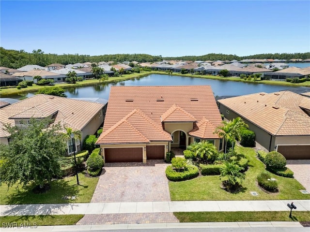 14016 Hawks Eye Ct, Estero, FL 33928 - drone / aerial view featuring a residential view and a water view