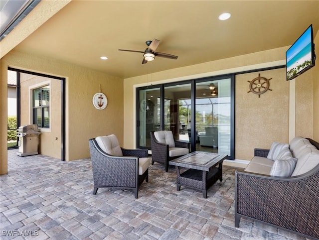 14016 Hawks Eye Ct, Estero, FL 33928 - view of patio / terrace with grilling area, an outdoor living space, and ceiling fan