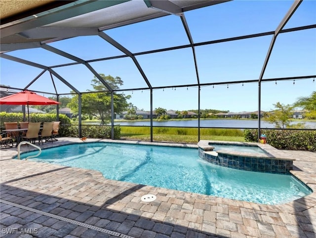 14016 Hawks Eye Ct, Estero, FL 33928 - view of swimming pool featuring glass enclosure, a pool with connected hot tub, a water view, and a patio area