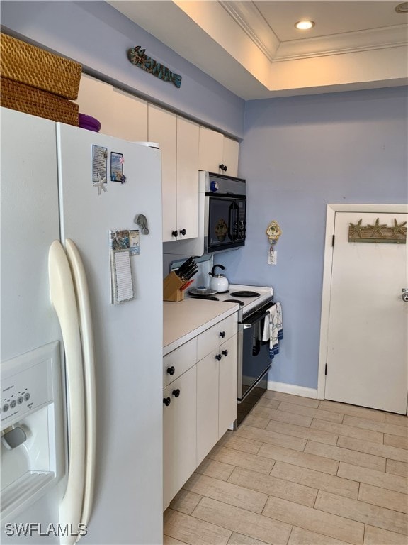 kitchen with black microwave, electric range oven, light countertops, ornamental molding, and white fridge with ice dispenser