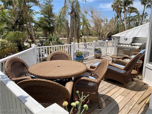deck with outdoor dining space