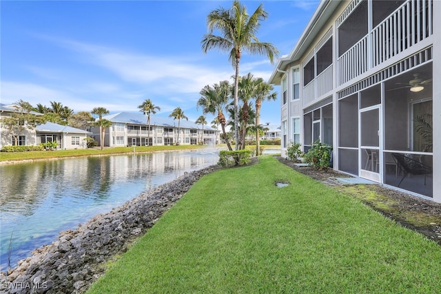7920 Mahogany Run Ln Unit 1015, Naples, FL 34113 - view of home's community with a lawn, a water view, and a residential view
