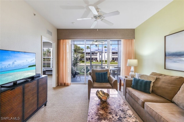 7920 Mahogany Run Ln Unit 1015, Naples, FL 34113 - living area with carpet floors, a ceiling fan, and visible vents