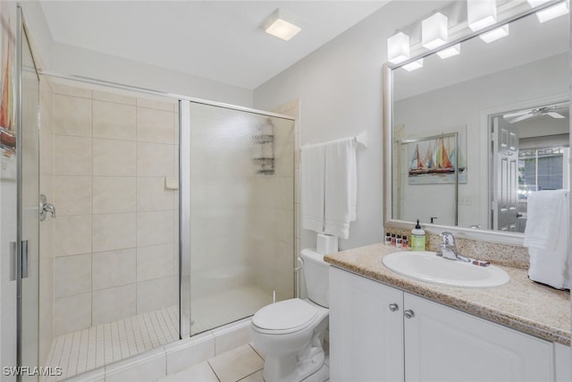 7920 Mahogany Run Ln Unit 1015, Naples, FL 34113 - full bath featuring vanity, a ceiling fan, a stall shower, and toilet