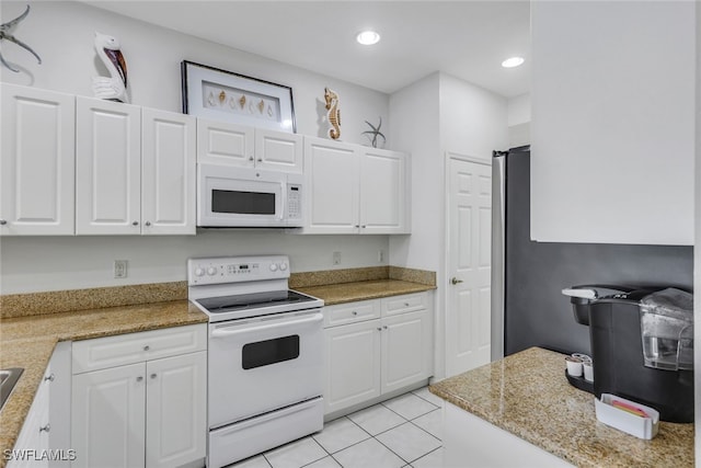 7920 Mahogany Run Ln Unit 1015, Naples, FL 34113 - kitchen featuring recessed lighting, light tile patterned floors, white cabinets, and white appliances