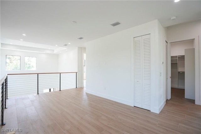 3384 Canal St, Naples, FL 34112 - spare room with baseboards, light wood-type flooring, visible vents, and recessed lighting
