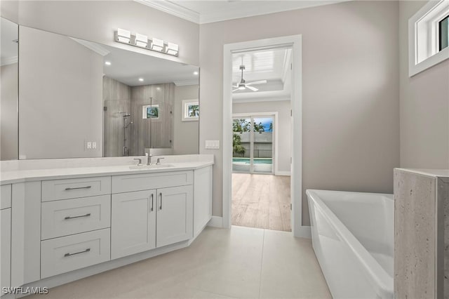 1134 Trail Terrace Dr, Naples, FL 34103 - bathroom featuring vanity, crown molding, a soaking tub, a stall shower, and a ceiling fan