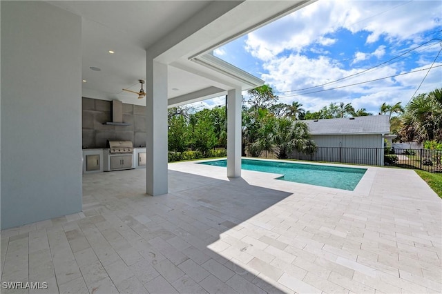 1134 Trail Terrace Dr, Naples, FL 34103 - view of swimming pool with a grill, fence, a fenced in pool, area for grilling, and a patio area