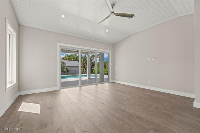 1134 Trail Terrace Dr, Naples, FL 34103 - spare room with wooden ceiling, baseboards, ceiling fan, and wood finished floors