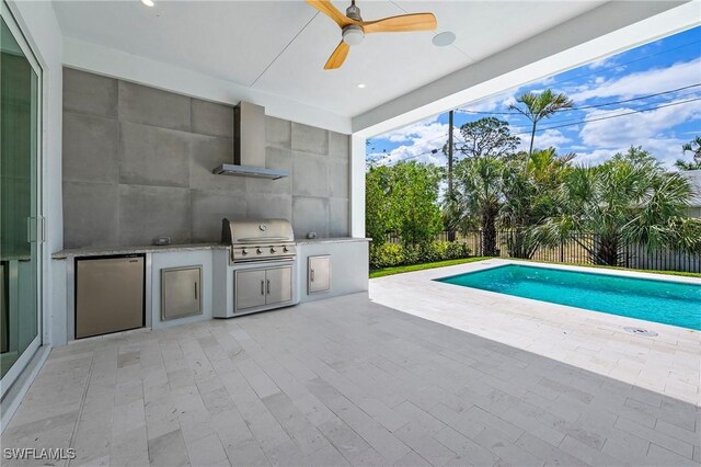 1134 Trail Terrace Dr, Naples, FL 34103 - view of pool featuring a grill, a fenced backyard, a fenced in pool, ceiling fan, and an outdoor kitchen