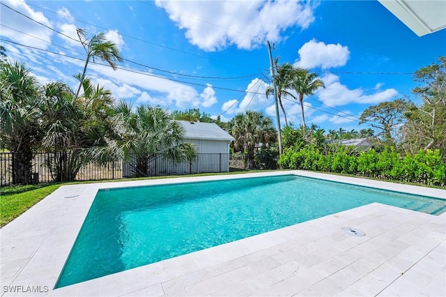 1134 Trail Terrace Dr, Naples, FL 34103 - view of swimming pool featuring a fenced in pool, fence, and a patio