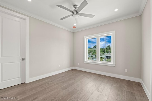 1134 Trail Terrace Dr, Naples, FL 34103 - spare room with ornamental molding, baseboards, and wood finished floors