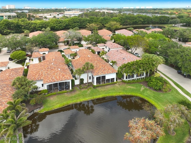 bird's eye view with a water view