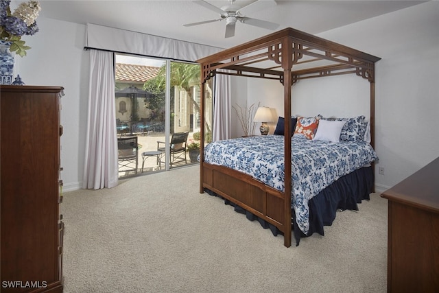carpeted bedroom with access to outside, ceiling fan, and baseboards