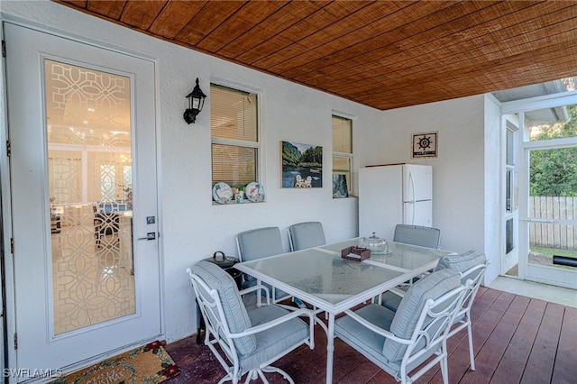 233 39th Ave NE, Naples, FL 34120 - sunroom / solarium featuring outdoor dining area