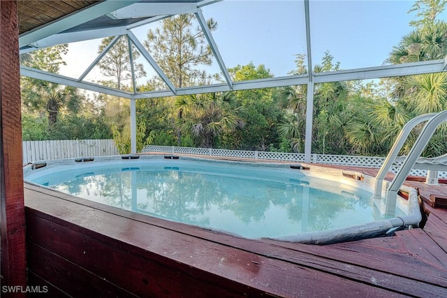 233 39th Ave NE, Naples, FL 34120 - swimming pool featuring fence and a lanai