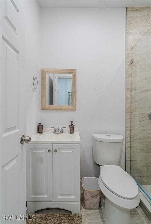 233 39th Ave NE, Naples, FL 34120 - full bath with a shower stall, toilet, and vanity
