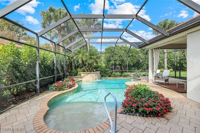 16017 Delarosa Ln, Naples, FL 34110 - outdoor pool with a lanai and a patio area