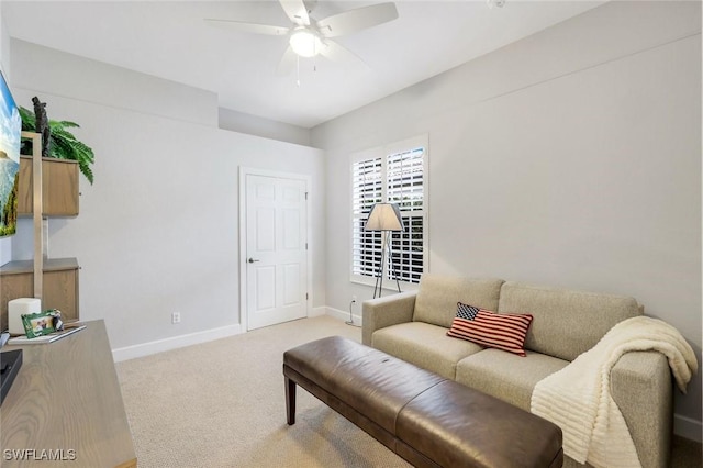 16017 Delarosa Ln, Naples, FL 34110 - living area featuring baseboards, ceiling fan, and light colored carpet