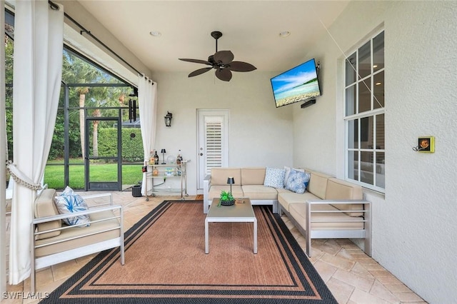 16017 Delarosa Ln, Naples, FL 34110 - sunroom / solarium featuring a ceiling fan and outdoor lounge area