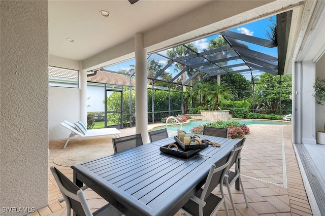 16017 Delarosa Ln, Naples, FL 34110 - view of patio with a lanai, outdoor dining area, and an outdoor pool