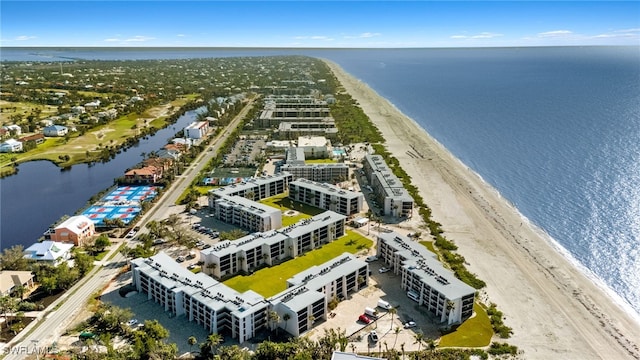 1501 Middle Gulf Dr Unit I-101, Sanibel, FL 33957 - drone / aerial view featuring a beach view and a water view