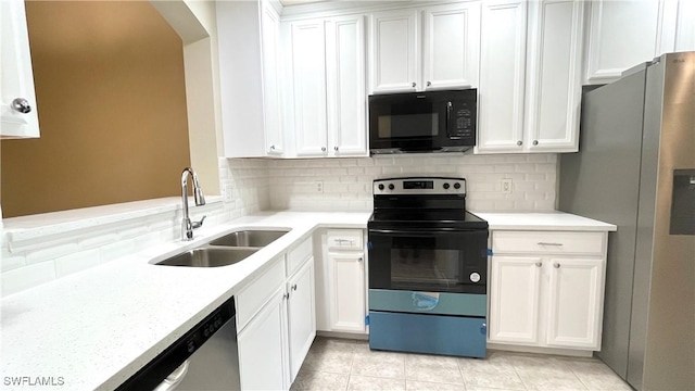 7725 Woodbrook Cir Unit 3503, Naples, FL 34104 - kitchen with black appliances, a sink, backsplash, and light countertops