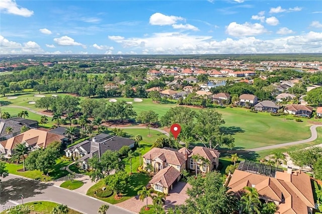bird's eye view featuring view of golf course and a residential view